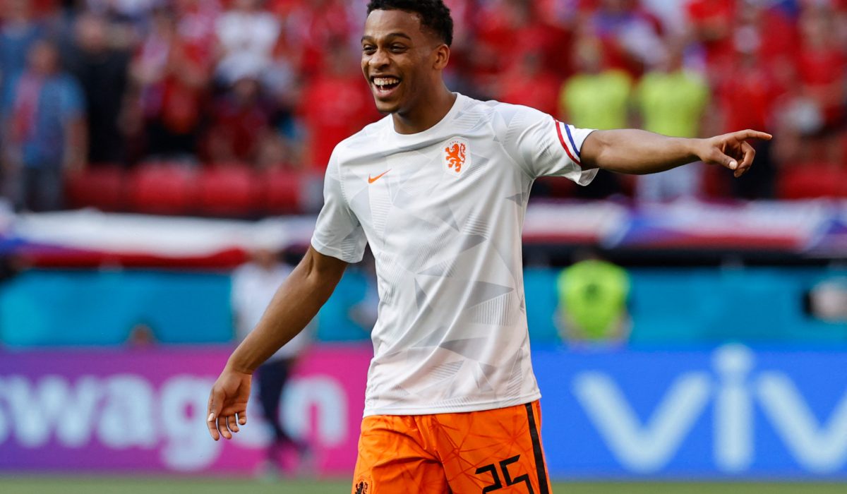 Netherlands' midfielder Jurrien Timber laughs as he warms up before the UEFA EURO 2020 round of 16 football match between the Netherlands and the Czech Republic at Puskas Arena in Budapest on June 27, 2021. (Photo by BERNADETT SZABO / POOL / AFP) (Photo by BERNADETT SZABO/POOL/AFP via Getty Images)