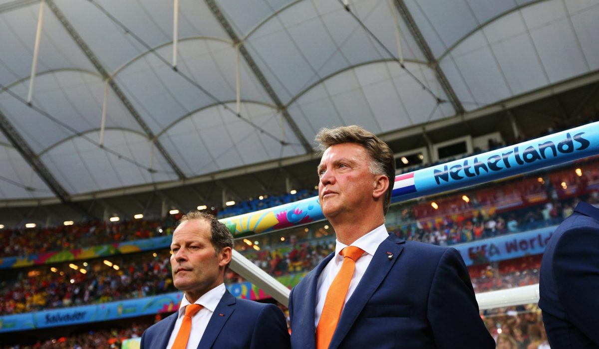 SALVADOR, BRAZIL - JULY 05:  Head Coach, Louis van Gaal (R) and his assistant, Danny Blind stand for the national anthem prior to the 2014 FIFA World Cup Brazil Quarter Final match between the Netherlands and Costa Rica at Arena Fonte Nova on July 5, 2014 in Salvador, Brazil.  (Photo by Dean Mouhtaropoulos/Getty Images)